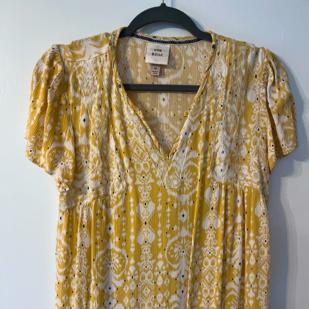 Yellow short sleeve blouse
